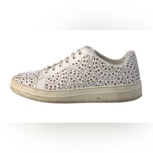 ALAÏA White Laser-Cut Leather Sneakers | IT 37 (US 7) 
Women's White Sneakers
